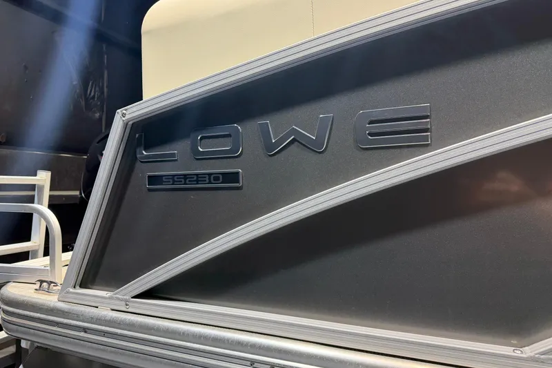 Slide: The Image of 2024 Lowe SS 230 boat side panel with logo and model name. - 5