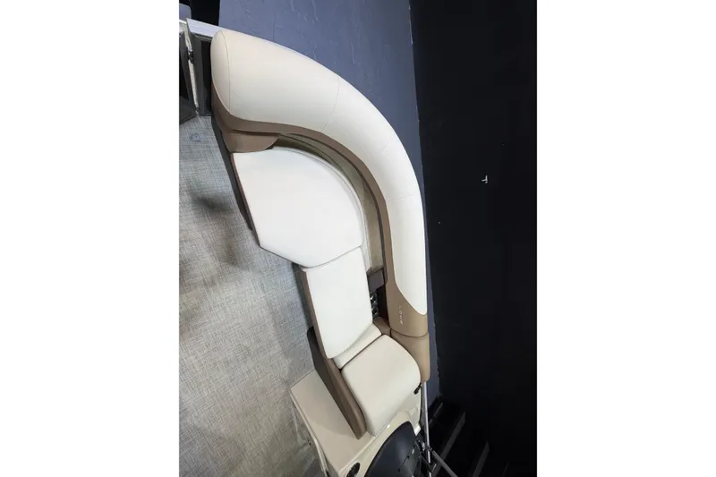 Slide: The Image of 2024 Lowe SS 230 boat seating with beige and white upholstery. - 8