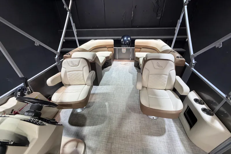 Slide: The Image of 2024 Lowe SS 230 boat interior with plush seating and modern design. - 9
