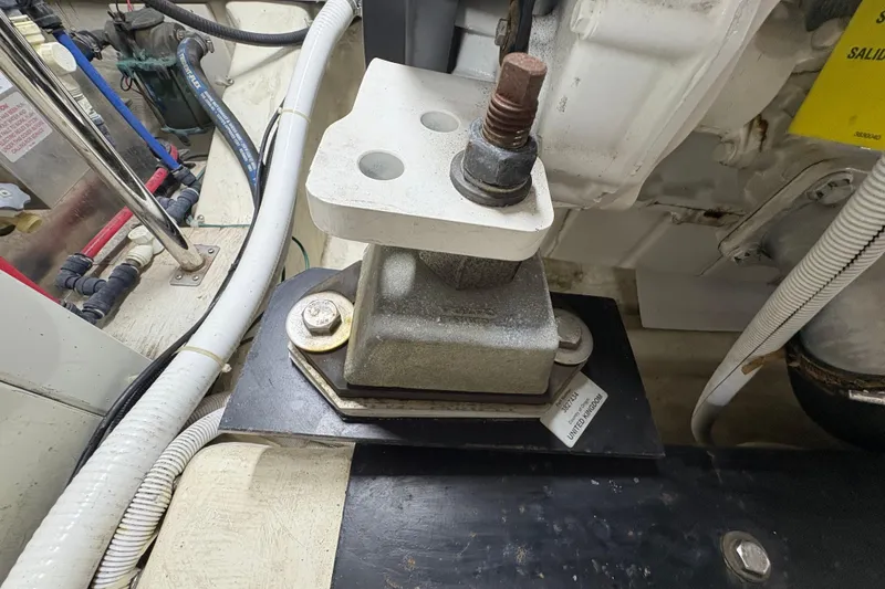 Slide: The Image of Engine mount detail of a 2004 Carver 560 Voyager yacht, showcasing mechanical components. - 88