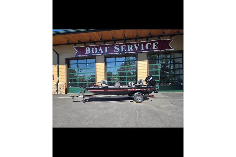 The Image of 2024 Tracker Bass Tracker Classic XL boat parked outside a boat service center. - 0