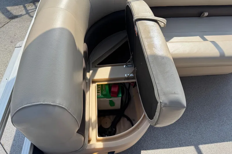 Slide: The Image of 2019 Sun Tracker Party Barge 18 DLX with open storage compartment under seat. - 17