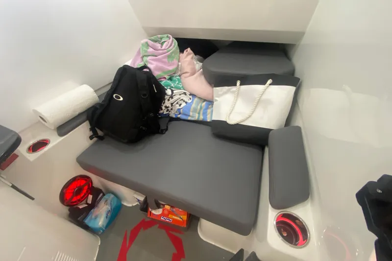 Slide: The Image of Interior cabin of 2025 Fountain 38 SCX boat with seating and storage items. - 29