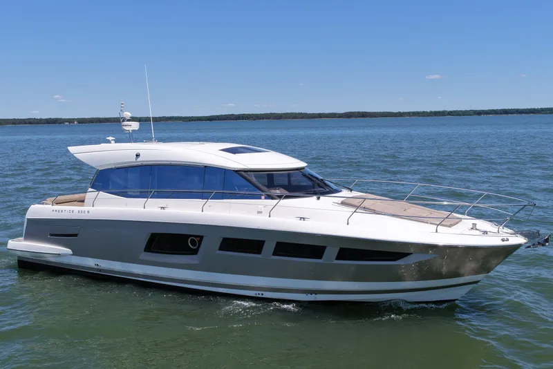 Slide: The Image of 2015 Prestige 500S yacht cruising on a calm, sunny day. - 10