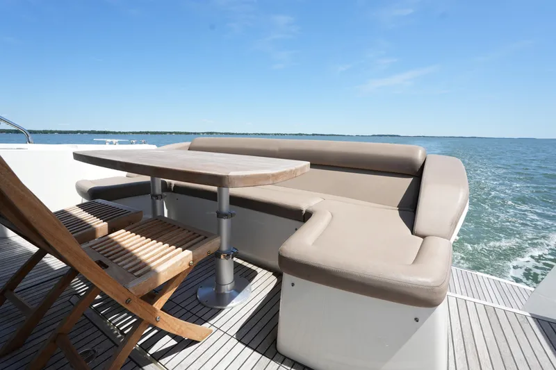 Slide: The Image of Luxury seating area on 2015 Prestige 500S yacht with ocean view. - 16