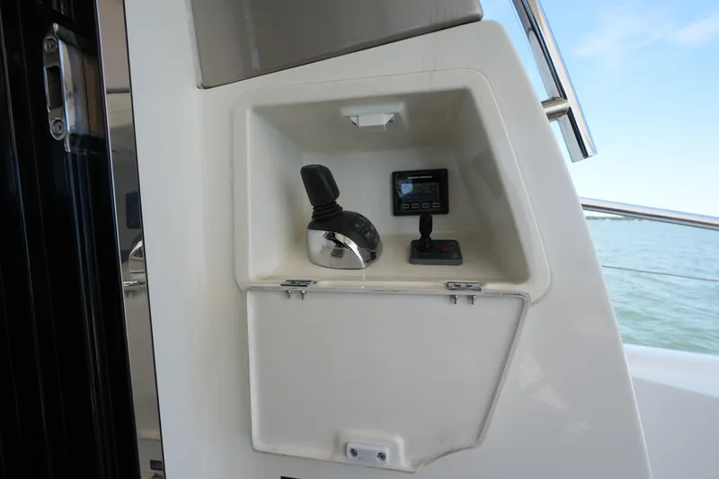 Slide: The Image of Control panel of a 2015 Prestige 500S yacht with joystick and display. - 18