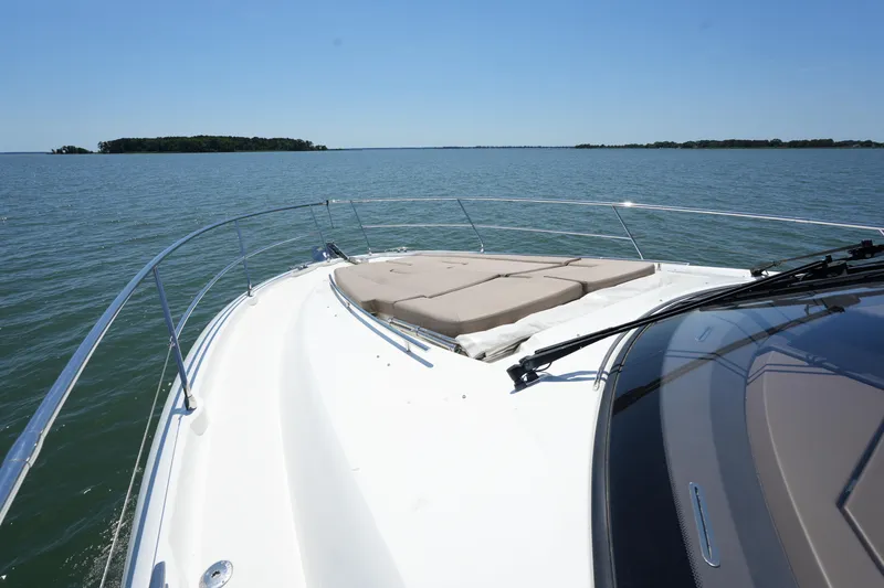 Slide: The Image of 2015 Prestige 500S yacht cruising on calm waters under clear blue skies. - 20