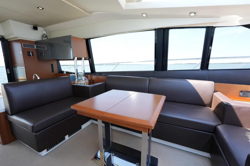 Slide: The Image of Luxurious interior of a 2015 Prestige 500S yacht with leather seating and modern design. - 40