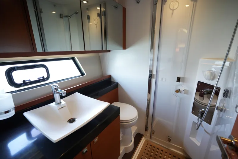 Slide: The Image of Luxurious bathroom in 2015 Prestige 500S yacht with modern fixtures and elegant design. - 58