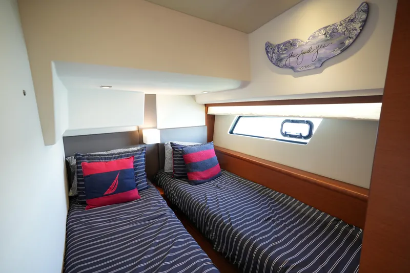 Slide: The Image of Twin cabin with striped bedding in 2015 Prestige 500S yacht. - 60