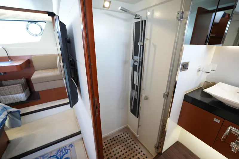 Slide: The Image of Luxurious bathroom interior of 2015 Prestige 500S yacht, featuring modern shower and sleek design. - 72