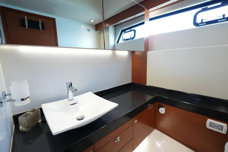 Slide: The Image of Luxurious bathroom interior of 2015 Prestige 500S yacht with modern sink and sleek design. - 73