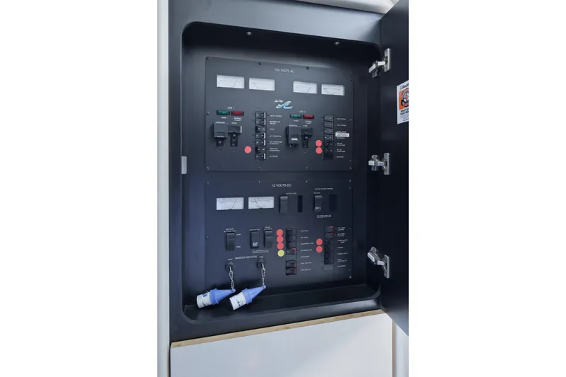 Slide: The Image of Electrical control panel of a 1997 Sea Ray 370 Aft Cabin boat. - 43