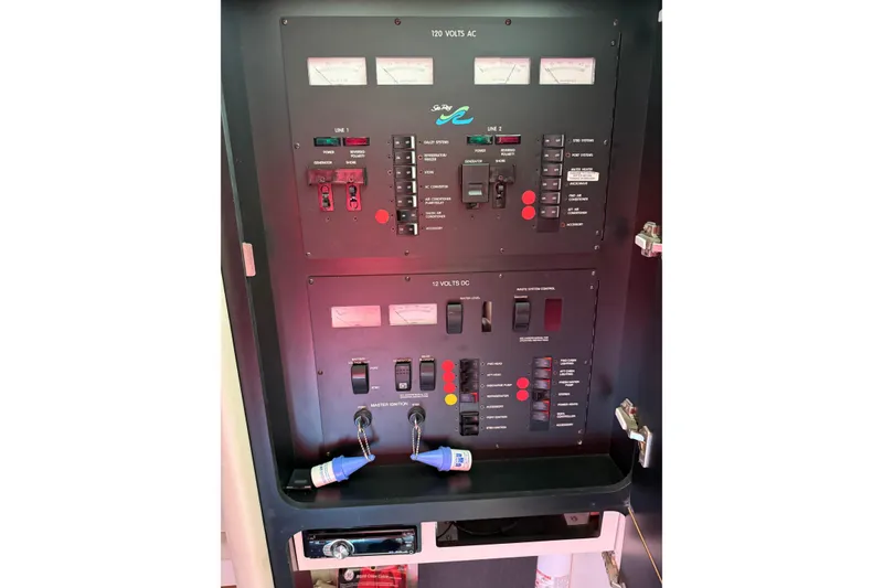 Slide: The Image of Electrical control panel of 1997 Sea Ray 370 Aft Cabin boat. - 44