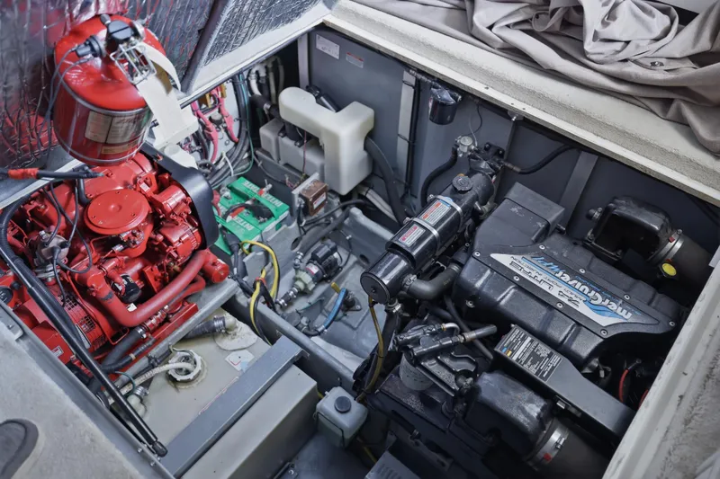 Slide: The Image of Engine compartment of a 1997 Sea Ray 370 Aft Cabin boat, featuring detailed machinery. - 45