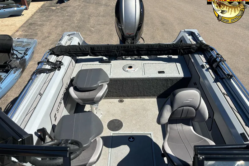 Slide: The Image of 2020 Starcraft Renegade 178 DC boat interior with seating and motor, viewed from above. - 10