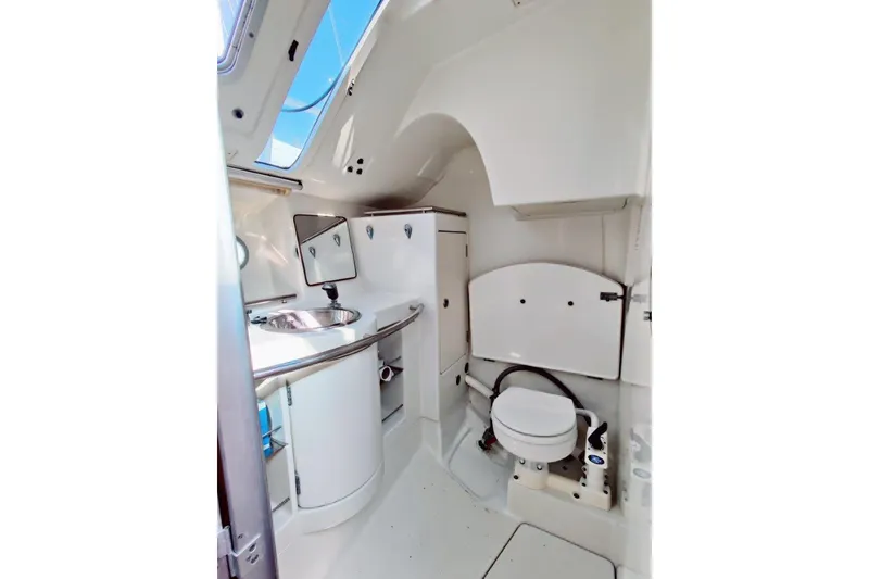 Slide: The Image of Interior of 1991 Beneteau First 38s5 yacht bathroom with sink and toilet. - 2