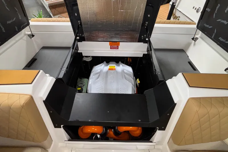 Slide: The Image of 2026 Tigé Z3 boat engine compartment with open hatch, showcasing modern design and components. - 15