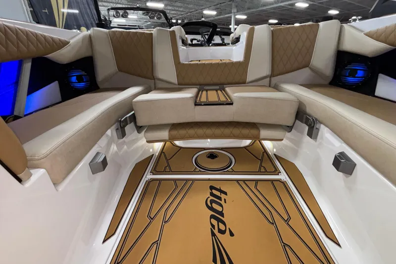 Slide: The Image of Luxurious interior of 2026 Tigé Z3 boat with tan seating and stylish flooring. - 24