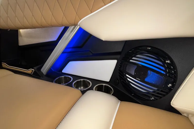 Slide: The Image of 2026 Tigé Z3 interior with beige upholstery, blue LED lighting, and integrated speaker system. - 31