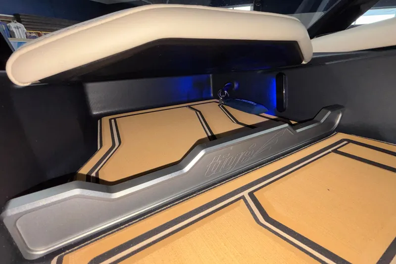 Slide: The Image of Interior view of 2026 Tigé Z3 boat with stylish flooring and seating. - 42