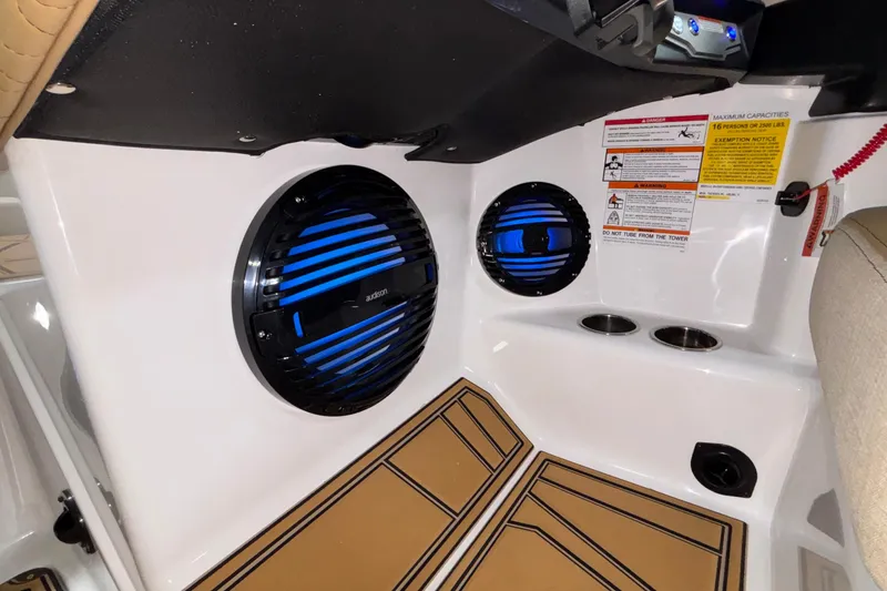 Slide: The Image of Interior of 2026 Tigé Z3 boat featuring speakers and cup holders. - 44