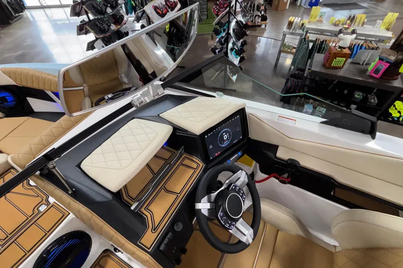 Slide: The Image of Interior of 2026 Tigé Z3 boat with modern dashboard and steering wheel. - 46