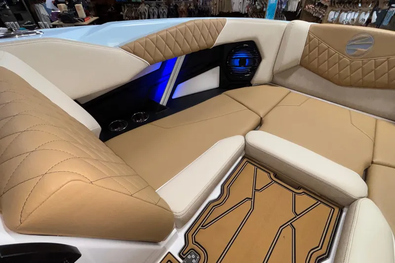 Slide: The Image of Luxurious interior of 2026 Tigé Z3 boat with tan and cream seating. - 48