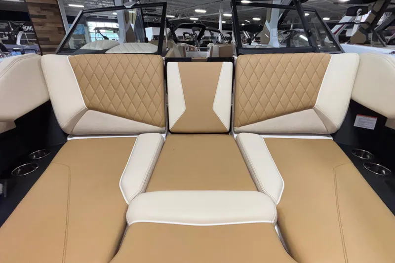 Slide: The Image of 2026 Tigé Z3 boat interior with tan and cream diamond-stitched upholstery. - 51