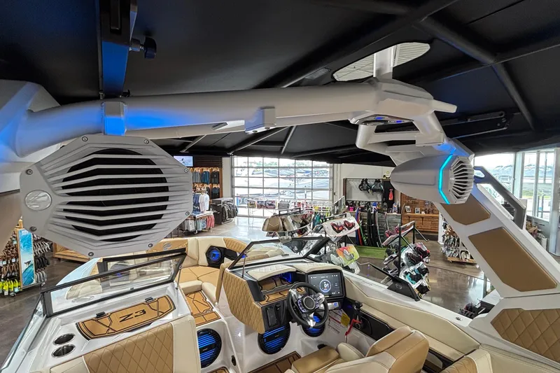 Slide: The Image of 2026 Tigé Z3 boat interior with advanced audio system and luxurious seating. - 59