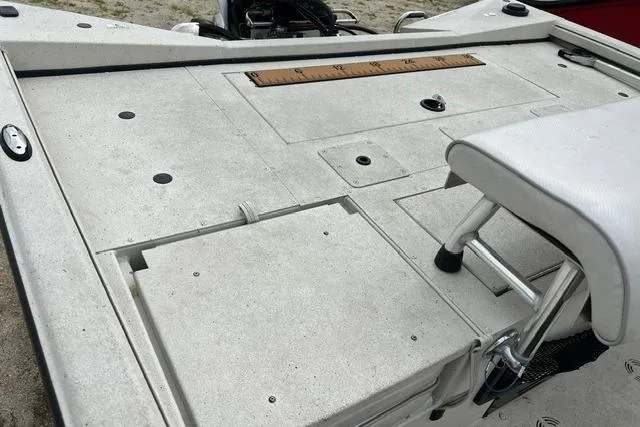 Slide: The Image of 2023 Ranger RB190 boat deck with seating and measuring ruler. - 3