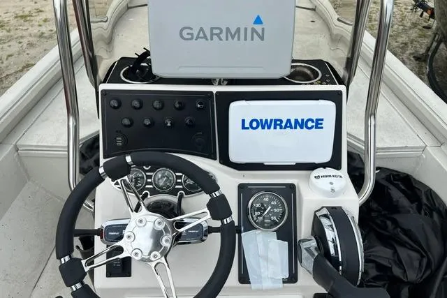 Slide: The Image of 2023 Ranger RB190 boat dashboard with Garmin and Lowrance navigation systems. - 4