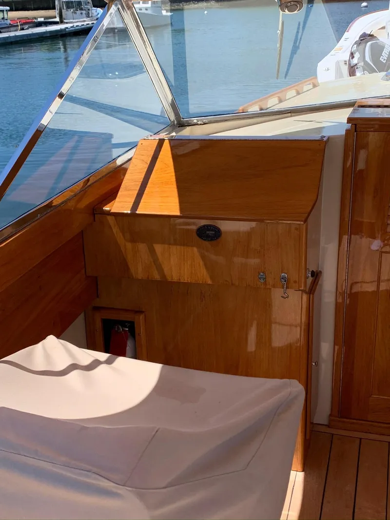 Slide: The Image of Interior of a 2014 Hunt Yachts Surfhunter 25 with wooden finish. - 18