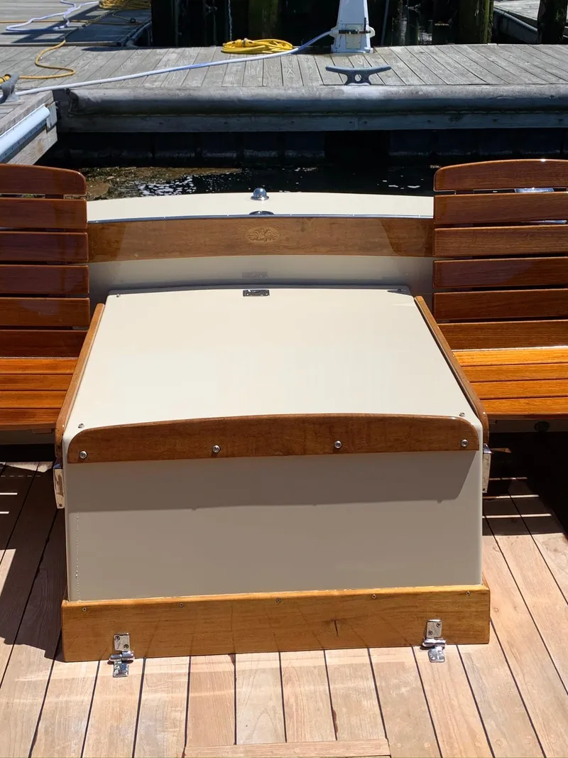 Slide: The Image of Hunt Yachts Surfhunter 25, 2014, with wooden accents at dock. - 26