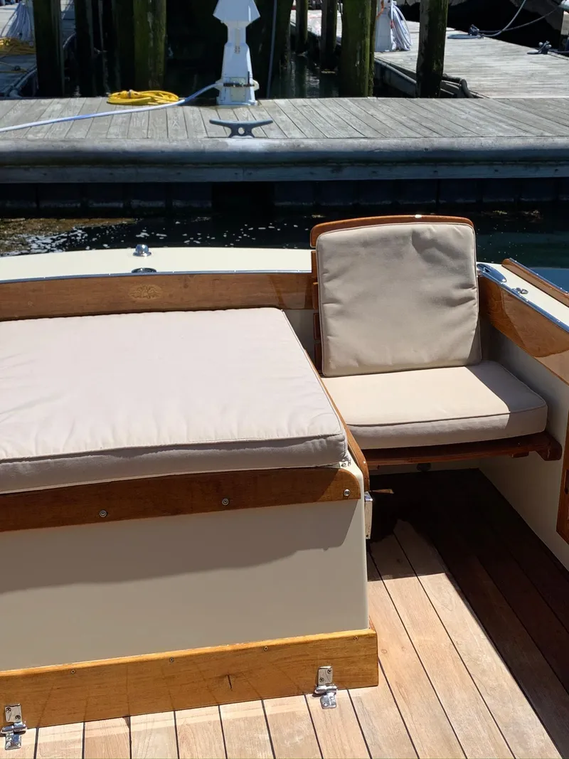 Slide: The Image of Interior of a 2014 Hunt Yachts Surfhunter 25 with wooden flooring. - 28
