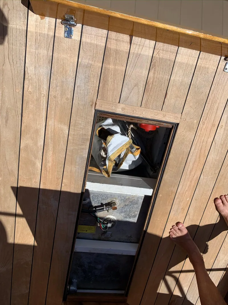 Slide: The Image of Wooden deck with storage compartment on 2014 Hunt Yachts Surfhunter 25. - 30