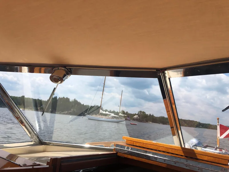 Slide: The Image of Interior view of a 2014 Hunt Yachts Surfhunter 25 overlooking the water. - 47
