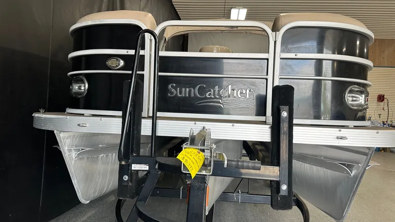 Slide: The Image of 2016 G3 SUNCATCHER X324SS pontoon boat indoors. - 14