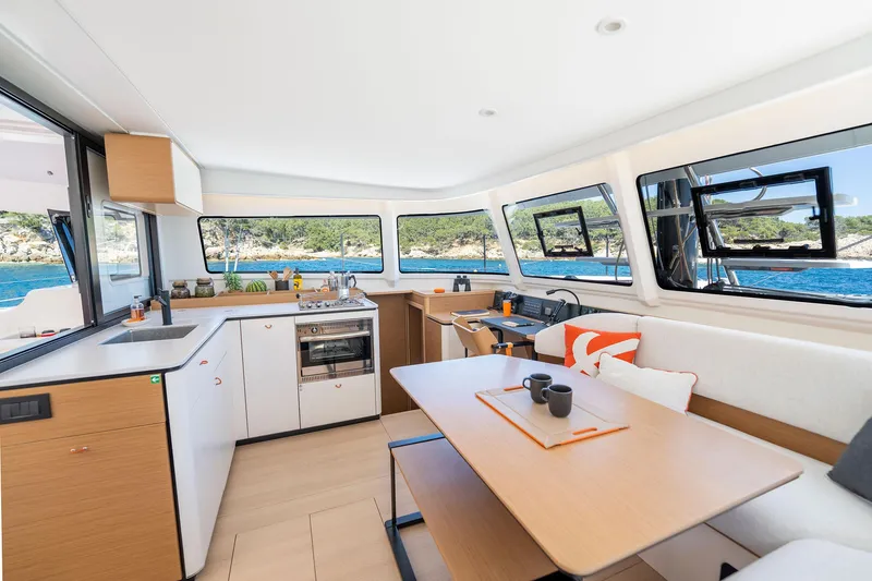 Slide: The Image of Luxurious interior of 2026 Excess 13 yacht with modern kitchen and scenic ocean views. - 19