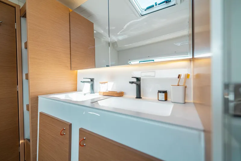 Slide: The Image of Modern bathroom interior in 2026 Excess 13 yacht, featuring sleek fixtures and wooden cabinetry. - 27