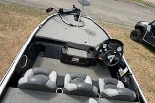 Slide: The Image of 2013 Nitro Z-6 boat interior with steering console and seating. - 5