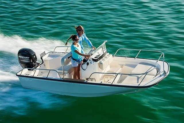 Slide: The Image of Manufacturer Provided Image: 2026 Boston Whaler 150 Montauk boat cruising on open water. - 3