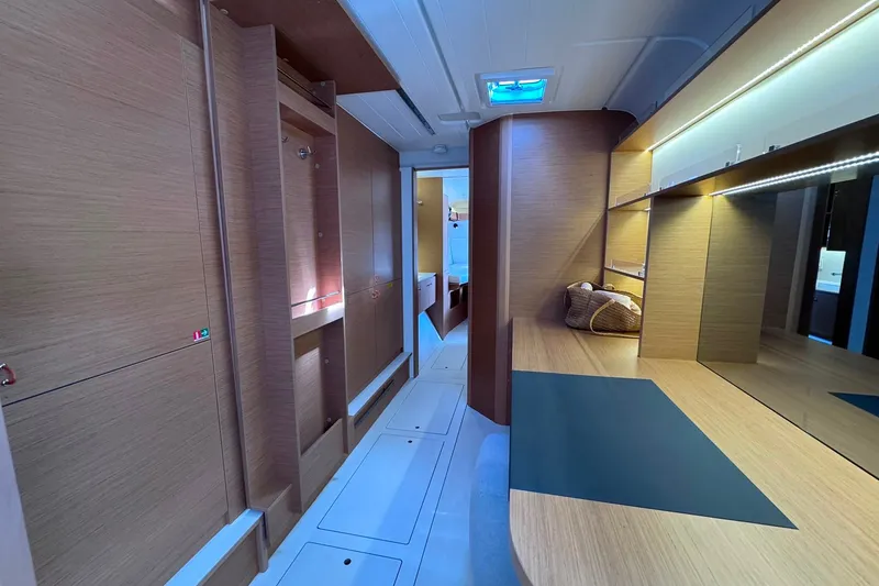 Slide: The Image of Modern interior of 2026 Excess 14 yacht with sleek wooden finishes and ambient lighting. - 67