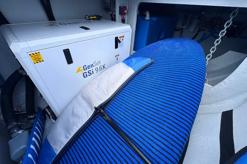 Slide: The Image of Generator compartment in Excess 14, 2026 model, with surfboard storage. - 39