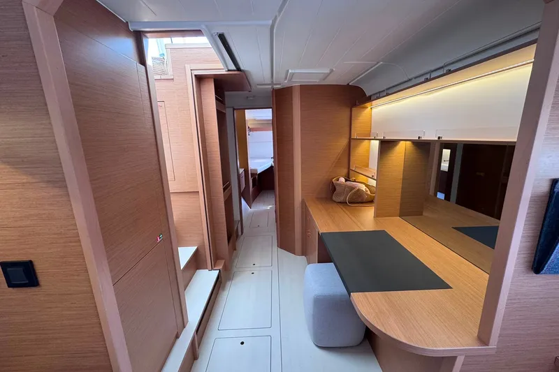 Slide: The Image of Luxurious interior of 2026 Excess 14 yacht featuring modern wood finishes and ambient lighting. - 62
