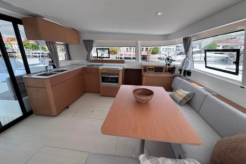 Slide: The Image of Modern interior of 2026 Excess 14 yacht with kitchen and dining area. - 45