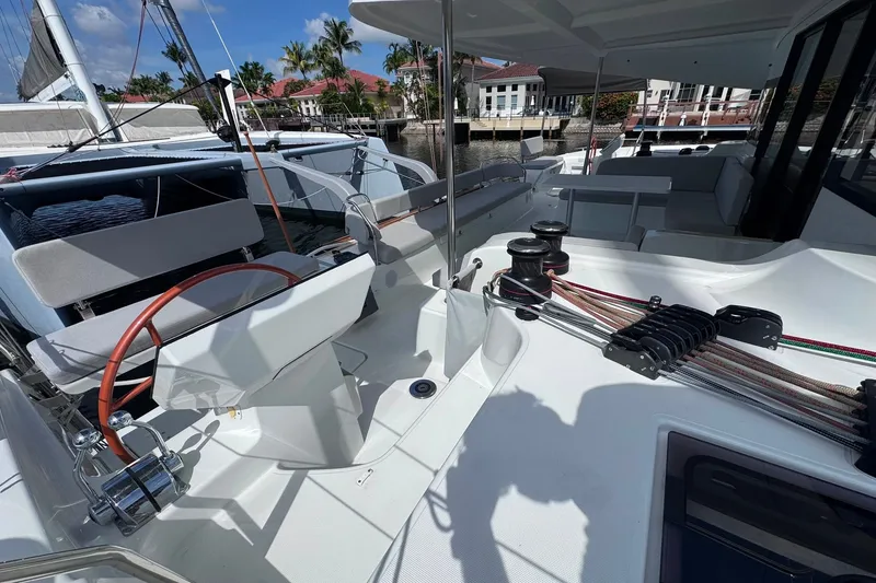 Slide: The Image of Modern Excess 14 sailboat deck, 2026 model, featuring sleek design and advanced rigging. - 37