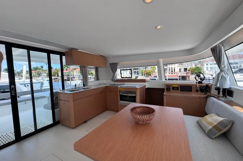 Slide: The Image of Modern interior of 2026 Excess 14 yacht with kitchen and dining area. - 54