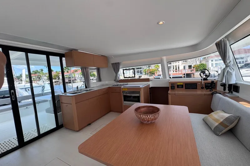 Slide: The Image of Modern interior of 2026 Excess 14 yacht with kitchen and seating area. - 48