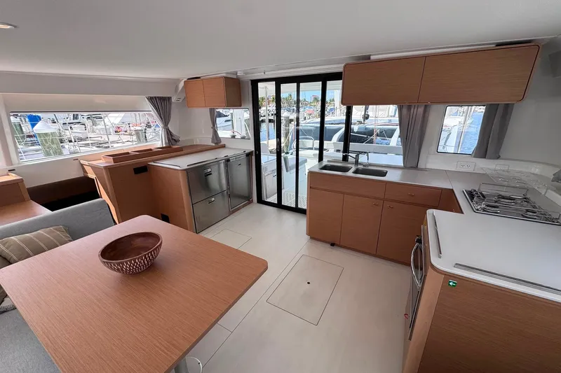 Slide: The Image of Modern interior of 2026 Excess 14 yacht with kitchen and dining area. - 50